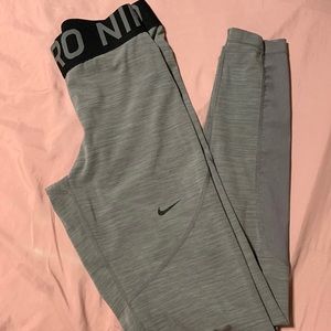 Nike dri-fit light grey with black workout leggings.